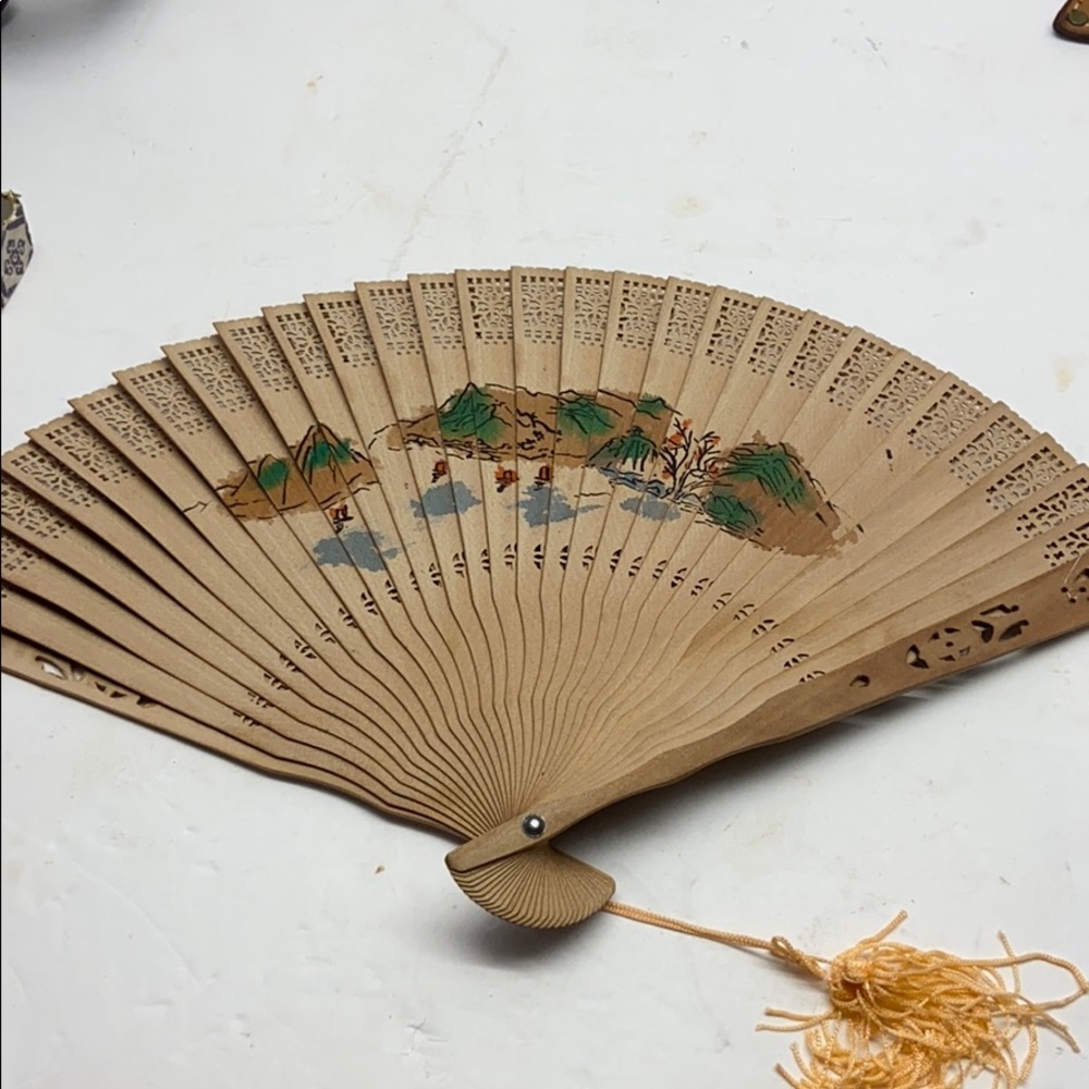 Vintage wooden folding fan